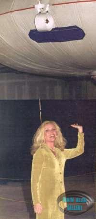 Deanna Lund and flying saucer (the Jupiter II?)