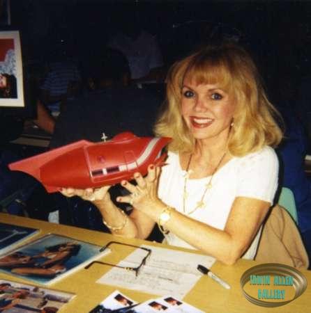 Deanna Lund holding the Spindrift model