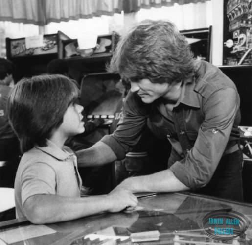 Adam Rich and Andrew Stevens in Framed by Fire
