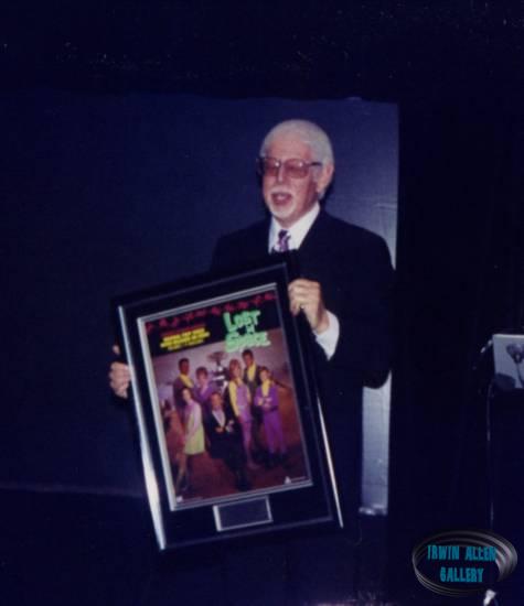 Dick Tufeld receives commemorative framed picture