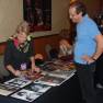 Heather Young signs photo for Kirk