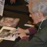 Derrik Lewis signing an autograph