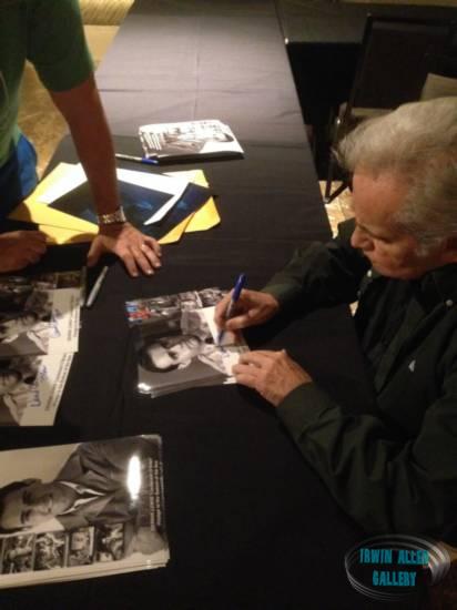 Derrik Lewis signing an autograph