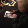 Derrik Lewis signing an autograph