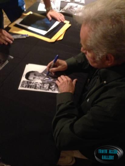 Derrik Lewis signing an autograph