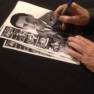 Derrik Lewis signing an autograph