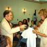 Dr. Fred presents T-Shirt to Deanna Lund