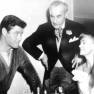Guy and June play chess while Fritz Feld watches