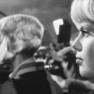 June and Marta watch filming