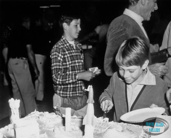 Billy Mumy cutting his birthday cake