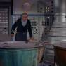 Dr. Smith in front of cabinets