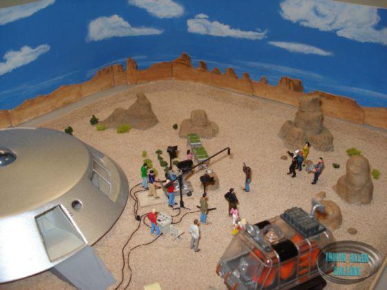 Scene with Small Jupiter 2 on Rock