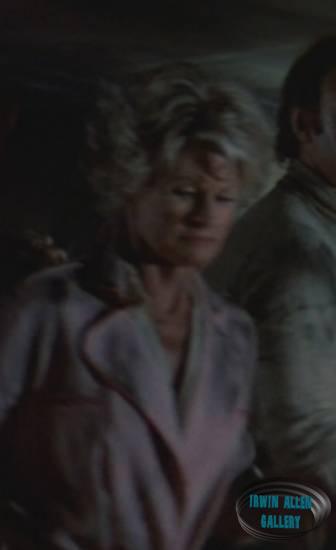 Lady in group following Doctor