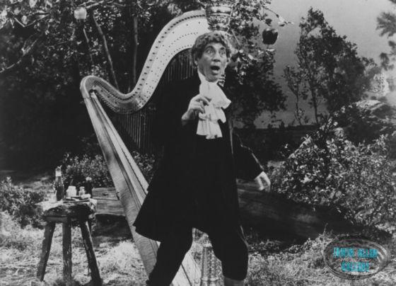 Harpo Marx as Sir Isaac Newton