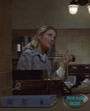 Mara Cook - Miss Cook, Secretary at School