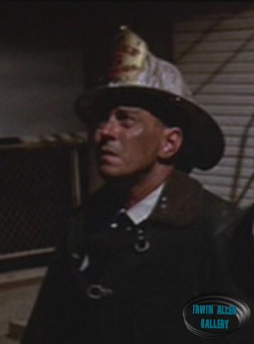Fireman on Peerless Building Roof