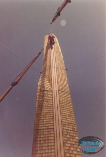 Working at Top of 70 Foot Tower Miniature