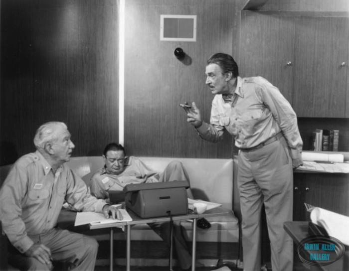 John Litel, Peter Lorre, and Walter Pidgeon.