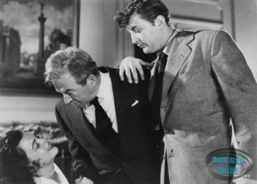 Faith Domergue, Claude Rains and Robert Mitchum