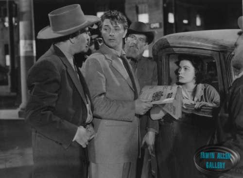 Robert Mitchum and Faith Domergue