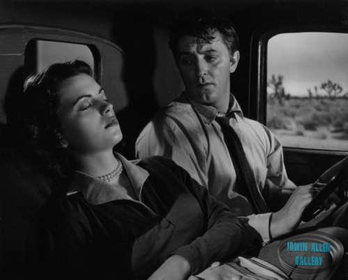 Faith Domergue and Robert Mitchum