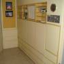 Stateroom With Bed and Desk Folded Up