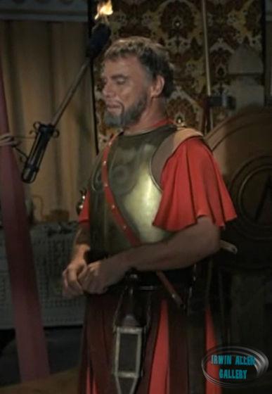 Ulysses (John Doucette) wearing two swords
